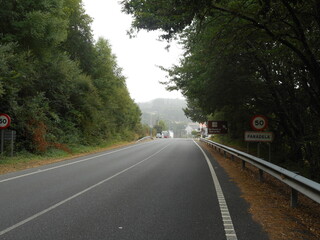Fototapeta na wymiar Empty country mountain road on a sunny day. Spain