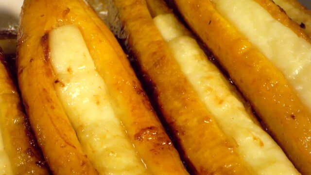 plantain with melted cheese on top from latin america