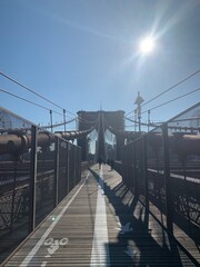 Sunny view of Brooklyn Bridge walkway 