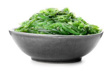 Bowl with tasty seaweed salad on white background