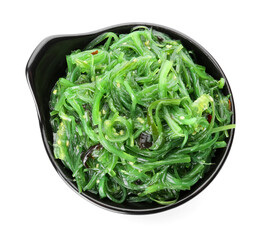 Bowl with tasty seaweed salad on white background