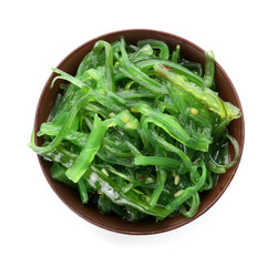 Bowl with tasty seaweed salad on white background
