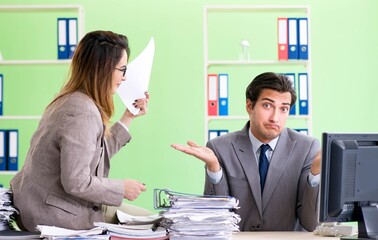 Two colleagues working in the office