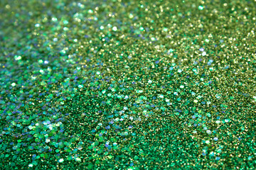Green glitter and sequins holographic background