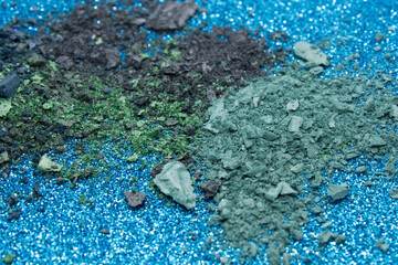 Colorful Eyeshadow on a Blue Glittery background