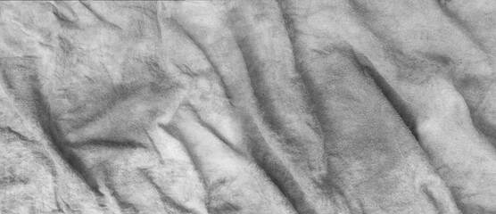 Old black and white cloth background with wrinkled fabric