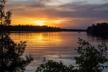 Fototapeta premium Still water reflections at sunset