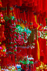 trade in multicolored tinsel for Chinese new year celebrations in Singapore