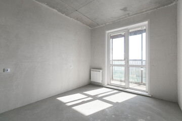 interior of the apartment without decoration in gray colors