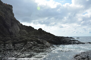 Obraz premium Danao beach resort rock formation and sea water