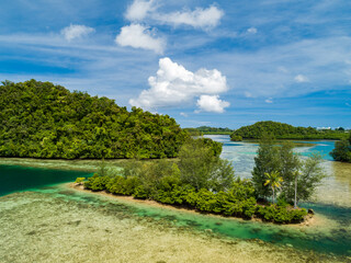 Aerial shot of tropical rock islands in calm tranquil secluded bay in Palau Micronesia