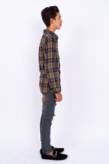 Naklejka premium Portrait of young handsome Indian teenage boy