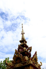 Golden pagoda peak and sky
