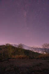 Obraz na płótnie Canvas hills with a star sky astrophotography