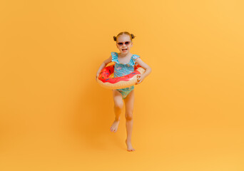 Happy child wearing swimsuit