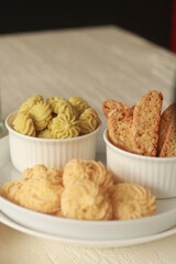 Assorted nice biscuits on the table.