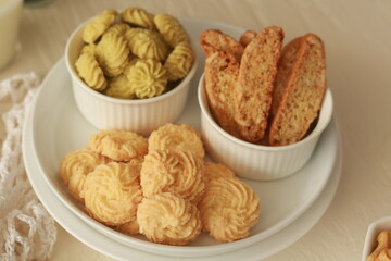 Assorted nice biscuits on the table.