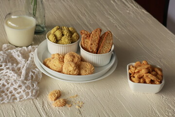 Assorted nice biscuits on the table.