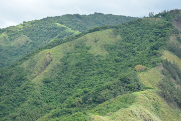 Fototapeta premium Rock formation at mountain view white beach resort