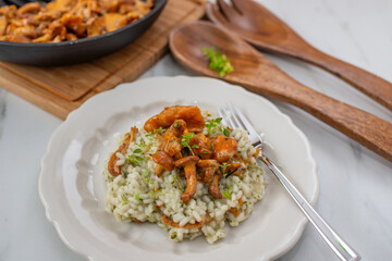 home made Risotto with chanterelle mushrooms and herbs