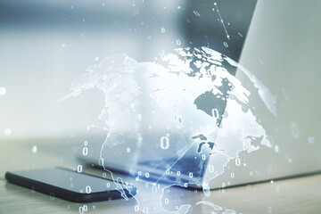 Multi exposure of abstract software development hologram with world map on laptop background, global research and analytics concept