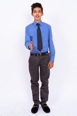 Portrait of young handsome Indian teenage boy as businessman