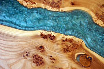 Wooden table with decorative epoxy resin