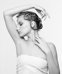 Black and white portrait in high key tone female with creative hairdo braids