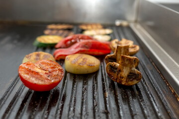 Cooking vegetables grill. Tomatoes, red peppers, champignons, eggplant - 370687192
