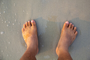 Naked feet on the Beach Background