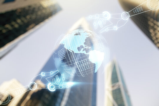 Double exposure of abstract virtual robotics technology with world map hologram on modern skyscrapers background. Research and development software concept