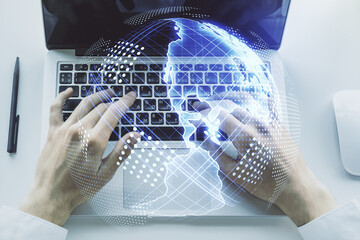 Digital America map and hands typing on laptop on background, international trading concept. Multiexposure