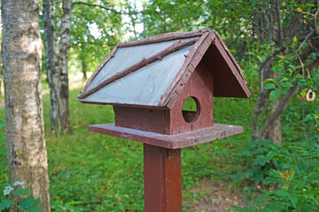 brown wooden birdhouse