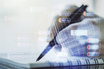 Double exposure of abstract creative programming illustration with world map and woman hand writing in notepad on background, big data and blockchain concept