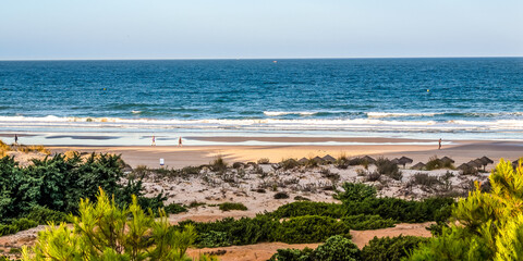 Sand dunes that give access to La Barrosa beach in Sancti Petri, Cádiz, Spain.