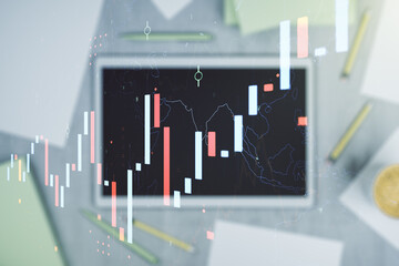 Multi exposure of abstract financial diagram and modern digital tablet on background, banking and...