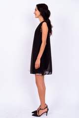 Portrait of happy young beautiful businesswoman against white background