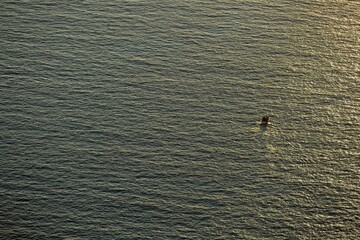 A lone boat in calm Mediterranean waters