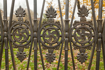 Cast figured lattice in an autumn park
