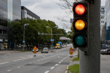 Traffic sign. Green and yellow traffic light.