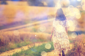 happy girl freedom in summer field, glare of the sun abstract background france provence autumn