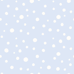 Cute white snow polka dot seamless pattern on light blue background. Snowflakes. Great for winter fabric, textile, nursery decoration, Christmas wrapping paper, scrapbooking. Surface pattern design.