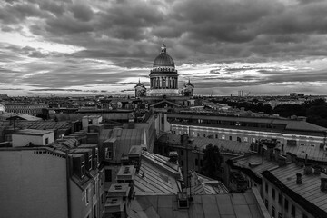 Fototapeta na wymiar Rooftop cityscape of Saint Petersburg with St Isaac's cathedral in time of sunset
