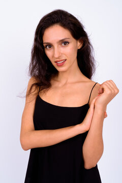 Portrait of happy young beautiful woman against white background