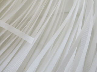 close-up of a bunch of white polyester straps