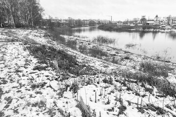 Winter river cityscape of small russian town