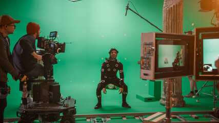 In the Big Film Studio Professional Crew Shooting Blockbuster Movie. Director Commands Camera...