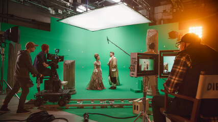 On Big Film Studio Professional Crew Shooting Period Costume Drama Movie. On Set: Director Controls...