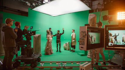 Film Studio Set: Shooting Green Screen Scene with Two Talented Actors Wearing Renaissance Clothes...