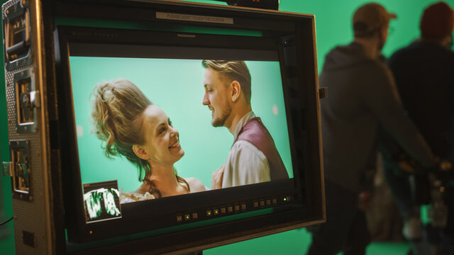 On Set Display Showing: Green Screen Scene With Two Actors Talented Wearing Renaissance Costumes Doing Romantic Drama Dialogue. Film Studio Professional Crew Shooting Historical Costume Drama Movie